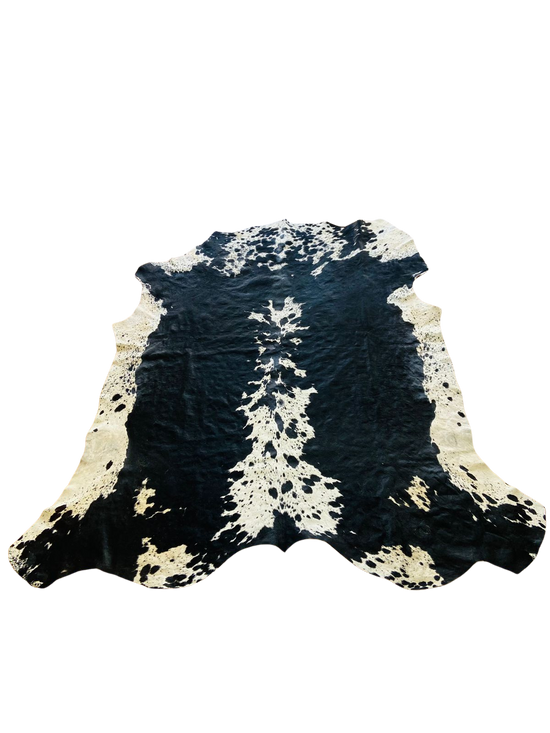 BLACK AND WHITE COW HIDE RUG