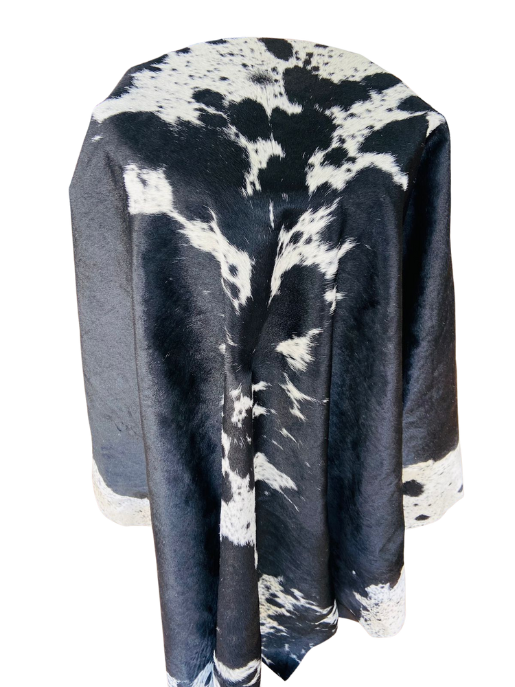 BLACK AND WHITE COW HIDE RUG