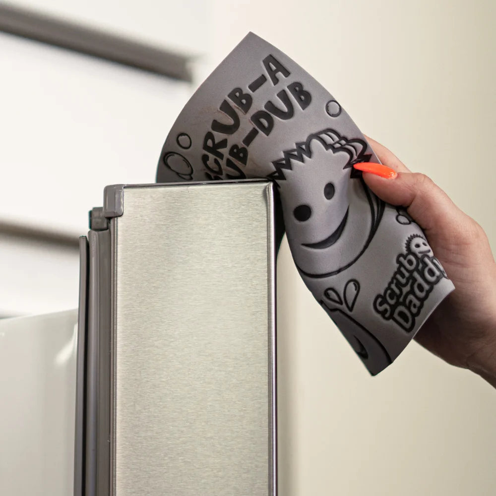 Damp Duster Towel being used to wipe a surface