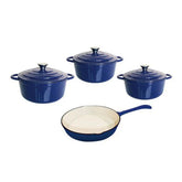 Set of blue cookware including pots and a pan on a white background