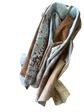 Folded brown, beige, and white COW HIDE 