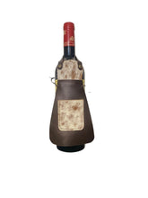 Wine bottle in a decorative leather holder