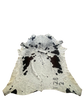Cowhide rug with black and white pattern on a white background